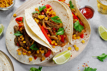 Mexican Tacos with Beef and Vegetables, Tacos al Pastor on Grey Background