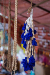 Traditional prayer beads are arranged for sale in a local shop 