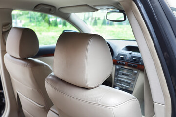 The headrests of the front seats in the car.