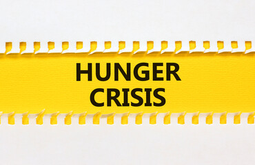 Hunger crisis symbol. Concept words Hunger crisis on beautiful yellow paper on beautiful white background. Business, support and Hunger crisis concept. Copy space.