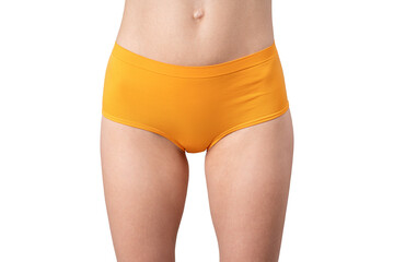 Fototapeta na wymiar Skinny woman in orange panties, slim female thighs, body care concept