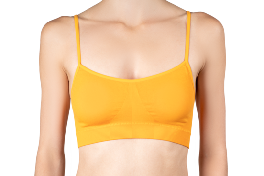 Woman in yellow top bra on gray background