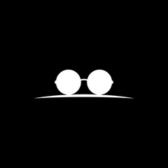 Sunglass vector icon isolated on black background 