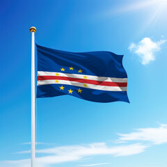 Waving flag of Cape Verde on flagpole with sky background.