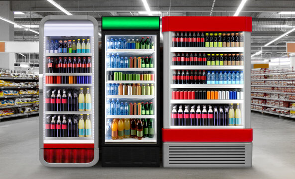 Soft drinks, Soda pop drinks and in Glass door commercial refrigeration in Supermarket.