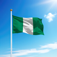 Waving flag of Nigeria on flagpole with sky background.