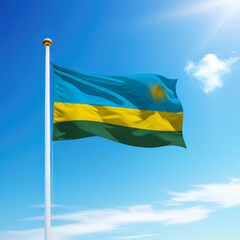 Waving flag of Rwanda on flagpole with sky background.