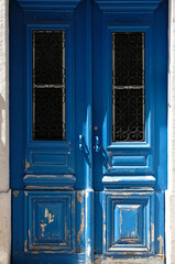 Weathered wooden door in Lisbon, Portugal
