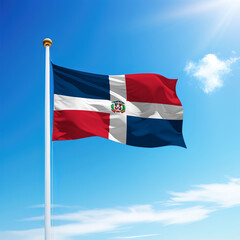Waving flag of Dominican Republic on flagpole with sky background.
