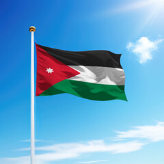 Waving flag of Jordan on flagpole with sky background.