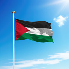 Waving flag of Palestine on flagpole with sky background.