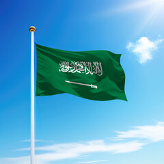 Waving flag of Saudi Arabia on flagpole with sky background.