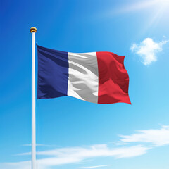 Naklejka na ściany i meble Waving flag of France on flagpole with sky background.