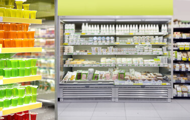 Choosing food from shelf in supermarket,vegetables in grocery section,Grocery stores