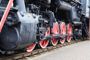 Black Retro steam train in the railway museum. Retro modes of transport