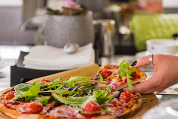 delicious and appetizing pizza, beautifully decorated, close-up