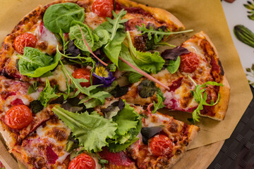 delicious and appetizing pizza, beautifully decorated, close-up