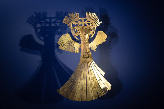 BOGOTA, COLOMBIA Indigenous bird chaman golden pectoral piece at golden museum
