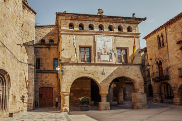 Fototapeta na wymiar Horta de Sant Joan. Old town with church and town hall.Terra Alta, Tarragona province, Catalonia,Spain