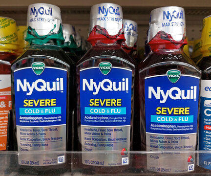 Vicks NyQuil bottles in a supermarket