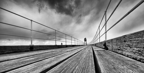 old wooden pier in monochrome