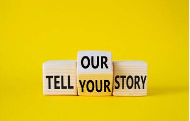 Tell Your or Our story symbol. Wooden cubes with words Tell Our story and Tell Your story. Beautiful yellow background. Business concept. Copy space