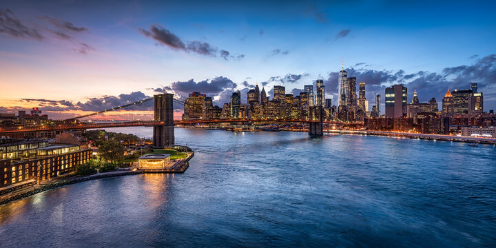 Brooklyn Bridge and Lower Manhattan at sunset, New York City, USA