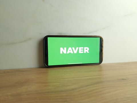 Konskie, Poland - June 24, 2023: Naver South Korean web portal logo displayed on mobile phone screen