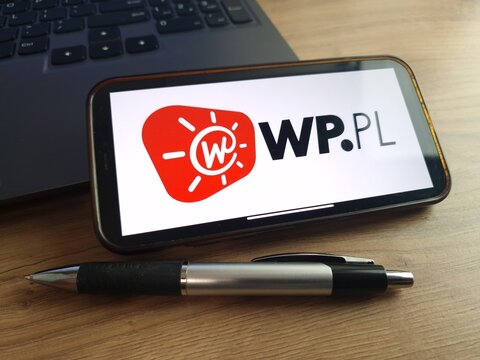 Konskie, Poland - June 24, 2023: Wirtualna Polska Polish web portal logo displayed on mobile phone screen
