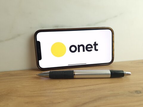 Konskie, Poland - June 24, 2023: Onet.pl Polish web portal logo displayed on mobile phone screen