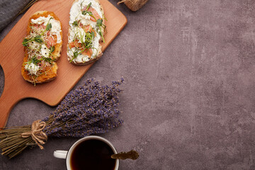 Sandwiches with smoked salmon, zucchini spread, coffee cup - healthy breakfast. FODMAP, KETO, Mediterranean diet, Low carb, healthy superfood.