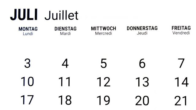 Time lapse zoom in motion of calendar month of July in german and french
