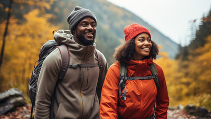 young couple hiking in the fall