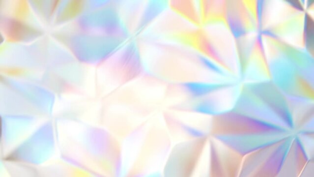 Relax video footage of slow motion soft focus holographic iridescent background. Abstract calm colourful video cover. Multicolour low poly effect wallpaper. Can use in vertical position.