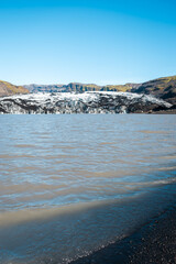 View of Sólheimajökull Glacier on a clear day in Iceland