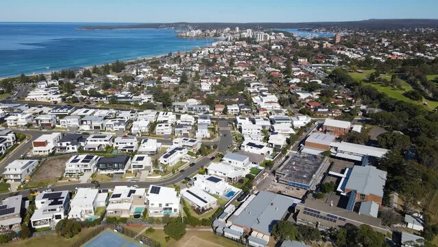 Aerial drone view of Cronulla in the Sutherland Shire, Sydney, NSW Australia looking in the south direction on a sunny day in June 2023 