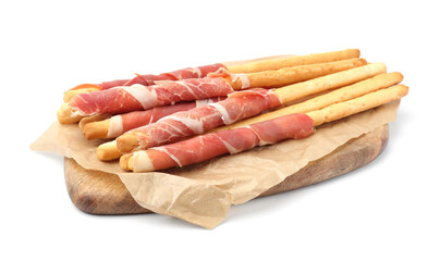 Delicious grissini sticks with prosciutto on white background