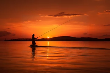 Foto auf Acrylglas Orange sunset silhouette fishing