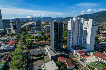 Fototapeta na wymiar Beautiful aerial view of the Sabana Park in San Jose Costa Rica, and its Skyscrapers, next to the National Stadium