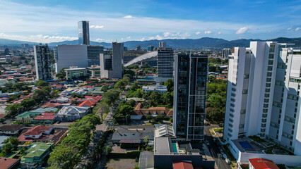 Beautiful aerial view of the Sabana Park in San Jose Costa Rica, and its Skyscrapers, next to the...
