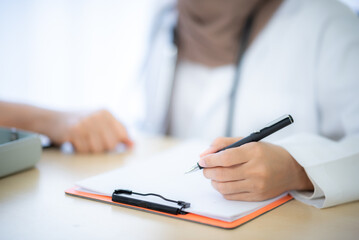 Doctor checking consultation with patient for checkup. work on healthcare paperwork and happiness of medical professional, checklist and report a results in hospital clinic, health insurance business