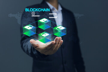 Blockchain technology concept with businessman and encrypted blocks. business man hand holding...
