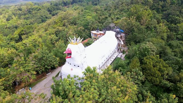 Iconic Chicken Church on Rhema hill in Indonesia, aerial orbit view