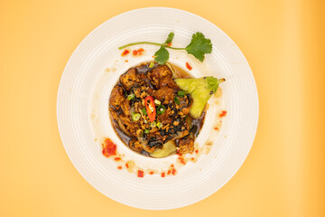 stylish vegan plate with aubergine