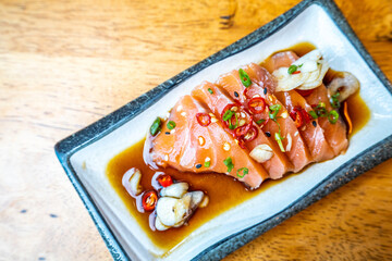 salmon sashimi wirh soy sauce in Japanese restaurant, Japanese Food