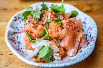 salmon sashimi with spicy sauce in Japanese restaurant, Japanese Food