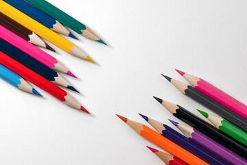 Color pencils isolated on white. Copy space and flat lay. Concept of back to school.