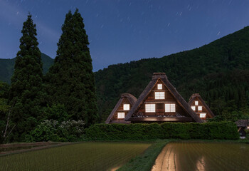 Idyllic landscape of historic village Shirakawa-go at night in Japan in Springtime