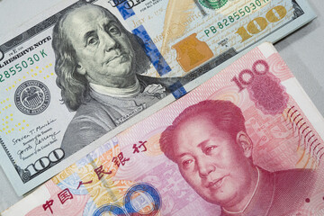 closeup of RMB and US dollars