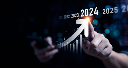 Business growing in 2024. analytical businessman planning business growth 2024, strategy digital marketing, profit income, economy, stock market trends and business, technical analysis strategy - obrazy, fototapety, plakaty